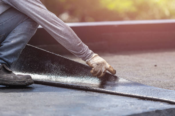 Professional Basement Waterproofing technician working in Riva, MD